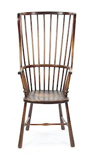 An English Oak Windsor Chair, Height 47 1/2 inches.