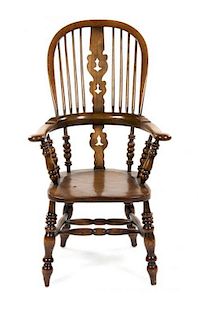* An English Walnut Windsor Chair, Height 45 1/2 inches.