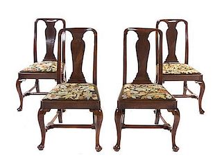 A Set of Four Queen Anne Walnut Side Chairs, 18TH CENTURY, Height 39 1/4 inches.