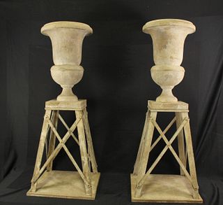 PAIR OF PAINTED TIN URNS ON A STANDS