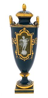 A Minton Pate-sur-Pate Porcelain Urn and Cover, Height 12 inches.