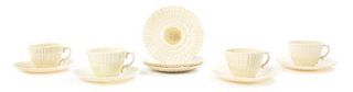 A Belleek Porcelain Tea Service for Four, Width of first over handle 10 3/4 inches.