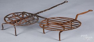 Two wrought iron rotating broilers, 19th c.
