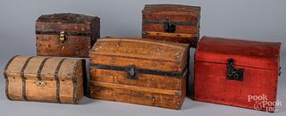 Five wood doll trunks, 19th c.