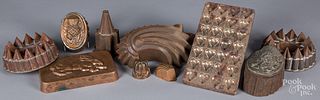 Group of tin and copper food molds