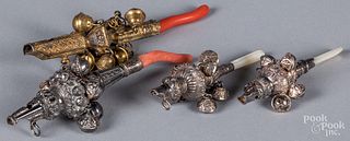 Four Victorian baby rattles/whistles