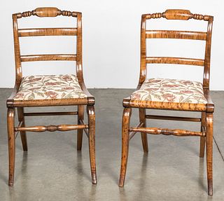 Pair of classical tiger maple sabre leg chairs