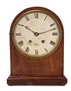 An English Mahogany Bracket Clock, Height 14 inches.
