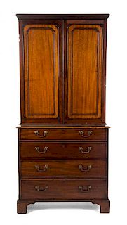 A George III Mahogany Bookcase, EARLY 19TH CENTURY, Height 74 x width 44 1/2 x depth 20 1/4 inches.
