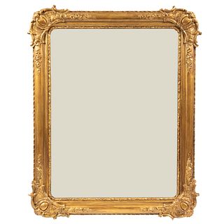 Espejo. Principios del SXX. Elaborado en madera dorada y luna rectangular. 80 x 100 cm