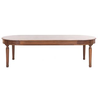 Mesa para comedor. SXX. Elaborada en madera. Cubierta oval con fustes anillados y soportes tipo carrete. 76 x 271 x 120 cm.