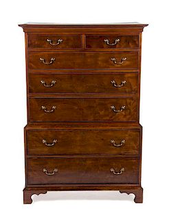 * A George III Mahogany Chest on Chest, LATE 18TH/EARLY 19TH CENTURY, Height 59 1/4 x width 40 1/2 x depth 20 inches.