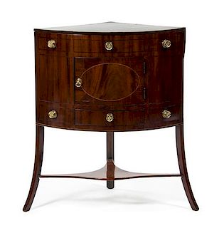 * A George III Mahogany Corner Washstand, EARLY 19TH CENTURY, Height 49 x width 26 1/2 x depth 19 inches.
