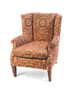 A George III Style Wingback Chair, Height 37 1/2 inches.