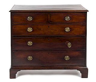 * An English Mahogany Chest of Drawers, MID-19TH CENTURY, Height 37 1/2 x width 43 x depth 21 1/2 inches.