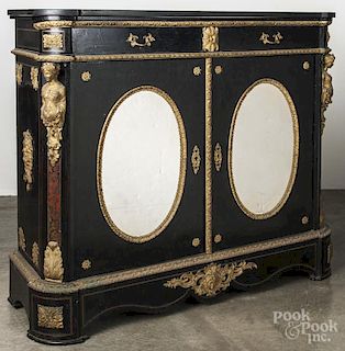 French ebonized side cabinet, 19th c., with gilt bronze mounts, a black marble top