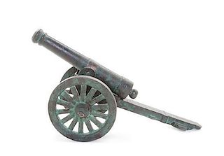 * A Cast Iron Model of a Cannon, Length 16 3/4 inches.