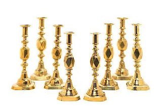 * Four Pairs of English Brass Diamond Jubilee Candlesticks, Height of tallest 12 1/2 inches.
