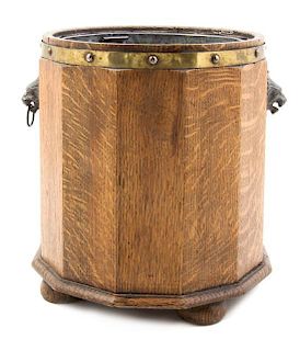 * An English Brass Mounted Oak Coal Bucket, Height 14 inches.