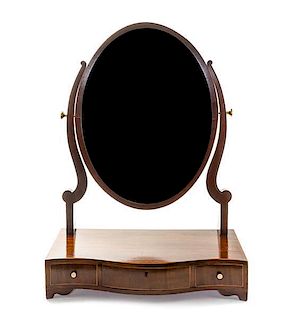 * A Regency Mahogany Dressing Mirror, EARLY 19TH CENTURY, Height 30 x width 21 3/4 x depth 9 inches.