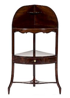 * A Regency Mahogany Corner Washstand, EARLY 19TH CENTURY, Height 43 x width 23 x depth 16 inches.