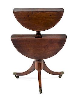 * A Regency Style Mahogany Two-Tiered Drop-Leaf Dumb Waiter, Height 31 3/4 inches.