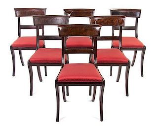 * A Set of Eleven Regency Style Mahogany Dining Chairs, 20TH CENTURY, Height 33 1/2 inches.