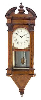 A Victorian Walnut Regulator Clock, Height 42 inches.