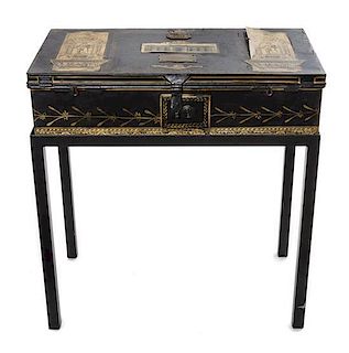 An English Toleware and Decoupage Trunk, 19TH CENTURY, RETAILED BY RIDPATH & MANNING, LONDON, Height of trunk 6 x width 22 1/2 x