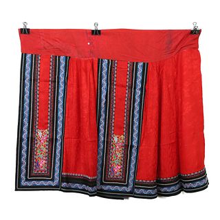 A RED-GROUND EMBROIDERED FLORAL SKIRT