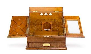 * An English Oak Stationery Box and Copy Press, S. MORDAN & CO., LONDON, Height 16 x width 16 x depth 13 1/2 inches.