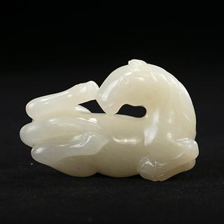 A WHITE JADE 'HORSE' CARVING