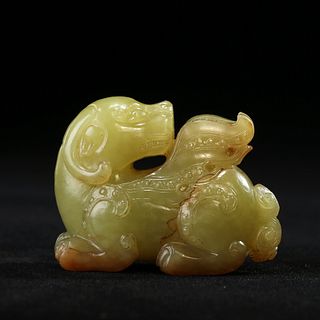 A YELLOW JADE 'MYTHICAL BEAST' CARVING