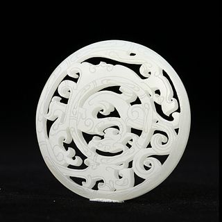 A CARVED JADE 'DRAGON' PENDANT