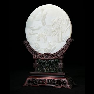 A WHITE JADE 'LANDSCAPE AND FIGURES' TABLE SCREEN