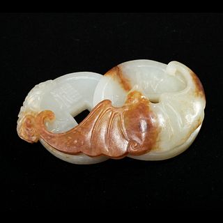 A WHITE AND RUSSET JADE 'BAT AND COINS' CARVING
