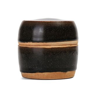 A BLACK-GLAZED CIRCULAR BOX AND COVER