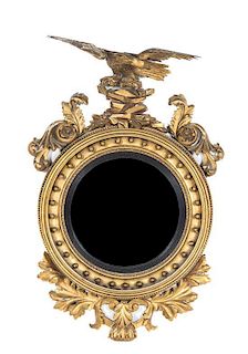A Federal Giltwood Bull's Eye Mirror, Height 48 x width 32 inches.