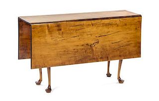 * An American Queen Anne Maple Drop-Leaf Table, LATE 18TH/EARLY 19TH CENTURY, THE TOP LATER, Height 27 1/2 x width 45 1/4 x dept