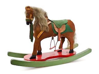 A Pair of American Painted Horsehair Applied Rocking Horses, Length 46 inches.