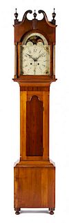* An American Cherry Long Case Clock, FIRST QUARTER 19TH CENTURY, JOHN ESTERLE, MAY TOWN, Height 89 1/2 inches.