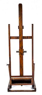 An American Oak and Iron Easel, Width 30 inches.