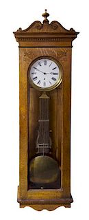An American Oak Jewelers Regulator Clock, Height 76 inches.