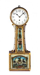 An American Banjo Clock, WATERBURY CLOCK CO., Height 29 1/8 inches.