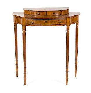 * A Sheraton Tiger Maple Dressing Table, 19TH CENTURY, Height 39 1/8 x width 36 x depth 17 1/4 inches.