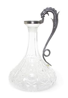 An American Metal Mounted Brilliant Cut Glass Ship's Decanter, Height 11 1/8 inches.