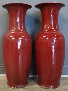 Pair of Chinese Sang De Boeuf Floor Vases.
