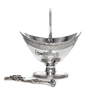 A George III Silver Sugar Basket, James Mince, London, 1791, having a swing handle, an engraved foliate band at the upper rim an