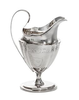 * A George III Irish Silver Creamer, Dublin, Circa 1800, maker's mark rubbed, possibly G&PW, having incised floral decoration.