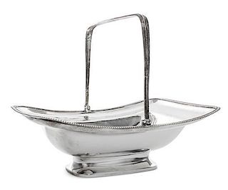 * A George III Silver Basket, Solomon Hougham, London, 1805, with a swing handle and a gadrooned border.